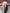 Weihnachtlicher Beanie Mockup – Frau mit grauer Mütze und rotem Bommel im urbanen Winter Look.
